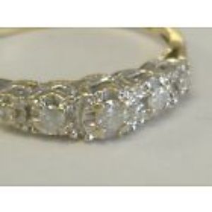10K Yellow Gold .20cts diamond ring. size 7